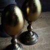 Gouden eieren op sokkel
