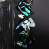 Antieke stolp met wit/ turqoise vlinder mix. Antieke stolp met wit/ turqoise vlinder mix.