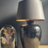 Zwart geglazuurde potlampen