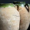 Set van drie authentieke olijfpotten