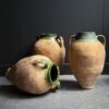 Set van drie authentieke olijfpotten