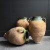 Set van drie authentieke olijfpotten